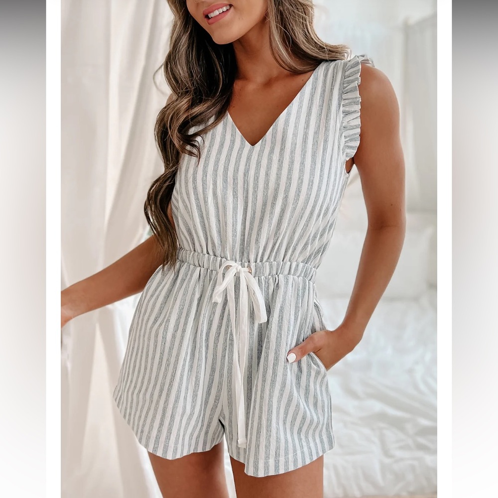 Blue/white striped romper with ruffle sleeveless detail